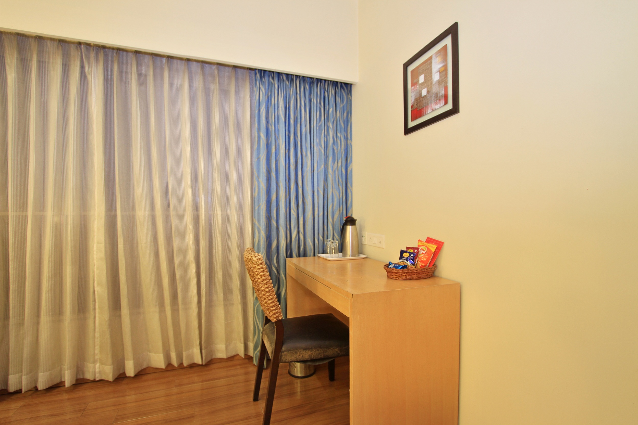 Deluxe Rooms at La Sara Hometel, Indiranagar 9